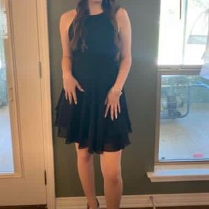 Worn once . It’s a very cute simple black dress.That was actually $300 .